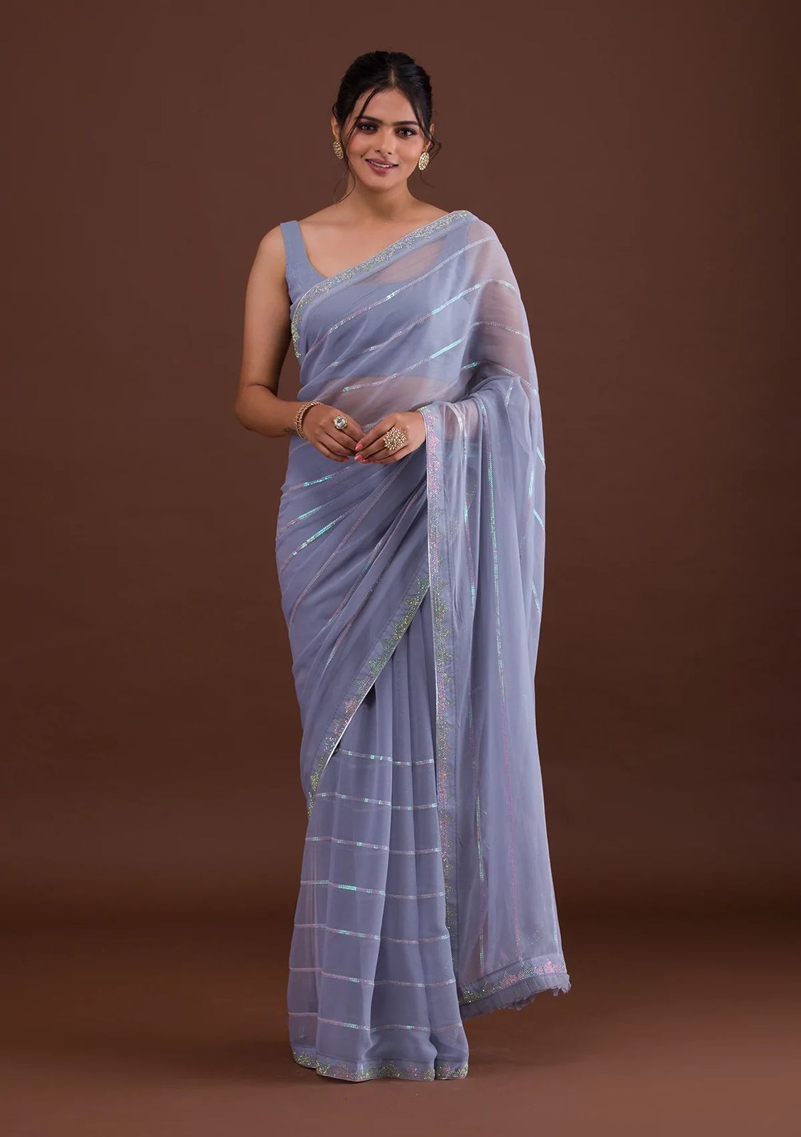 3027 Beautiful Party Wear Swarovski Diamond Wholesale Georgette Saree Catalog
